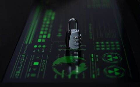 cyber-security-concept-padlock-and-hacker-screen-2023-11-27-05-10-37-utc_Medium